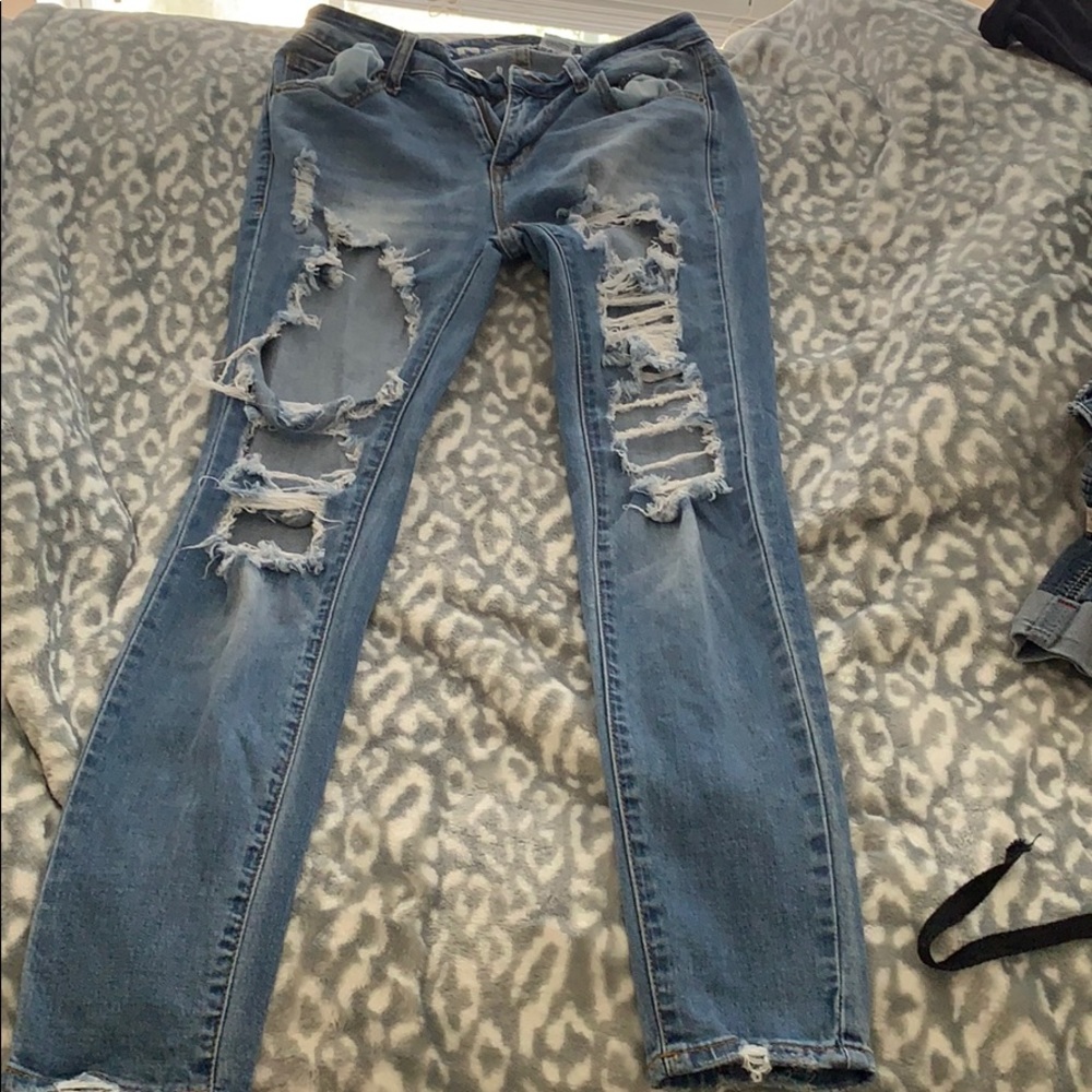 Blue distressed midrise jeans